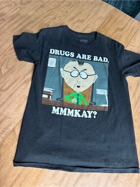 Black Graphic Short-Sleeve Tee Featuring Bold Cartoon Print
